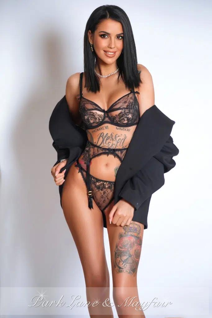 Erotic model Iris exuding confidence and sexiness in her lingerie